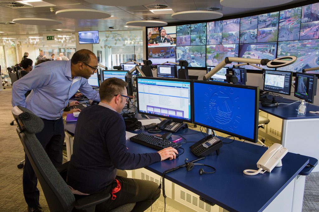 People looking at screens inside Bristol Operations Centre