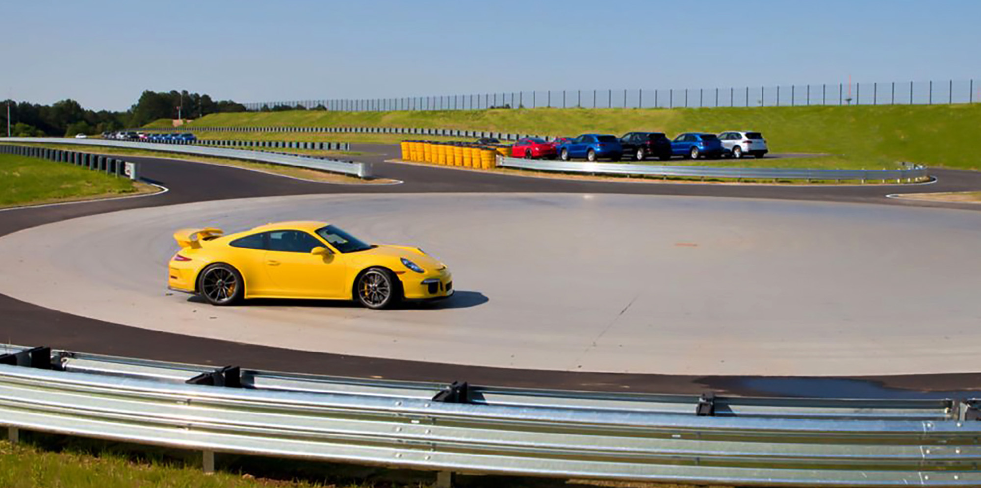 Yellow Porsche 911 Turbo SS at Porsche experience center