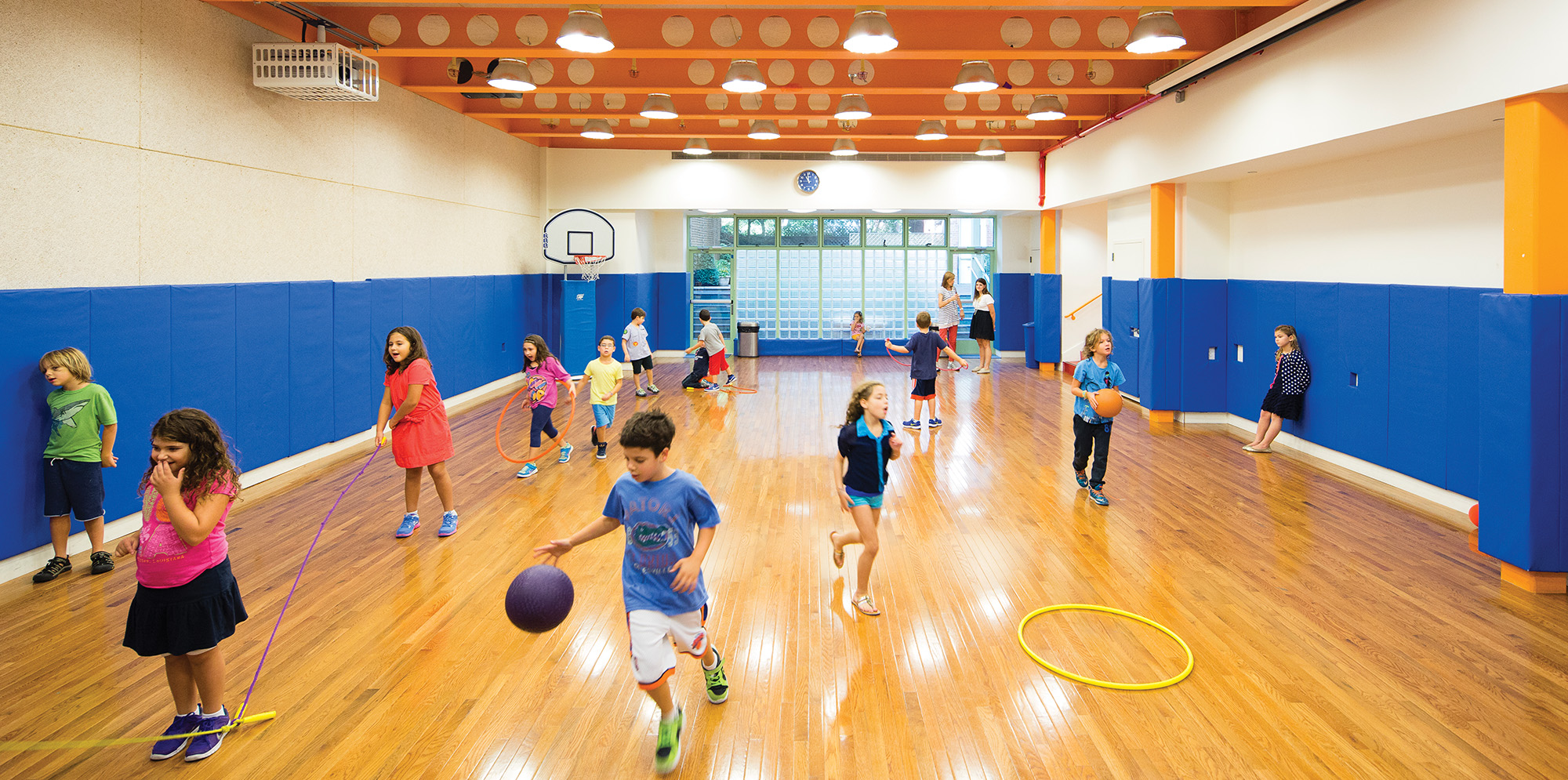 Children inside gymnasium at Columbia Grammar school