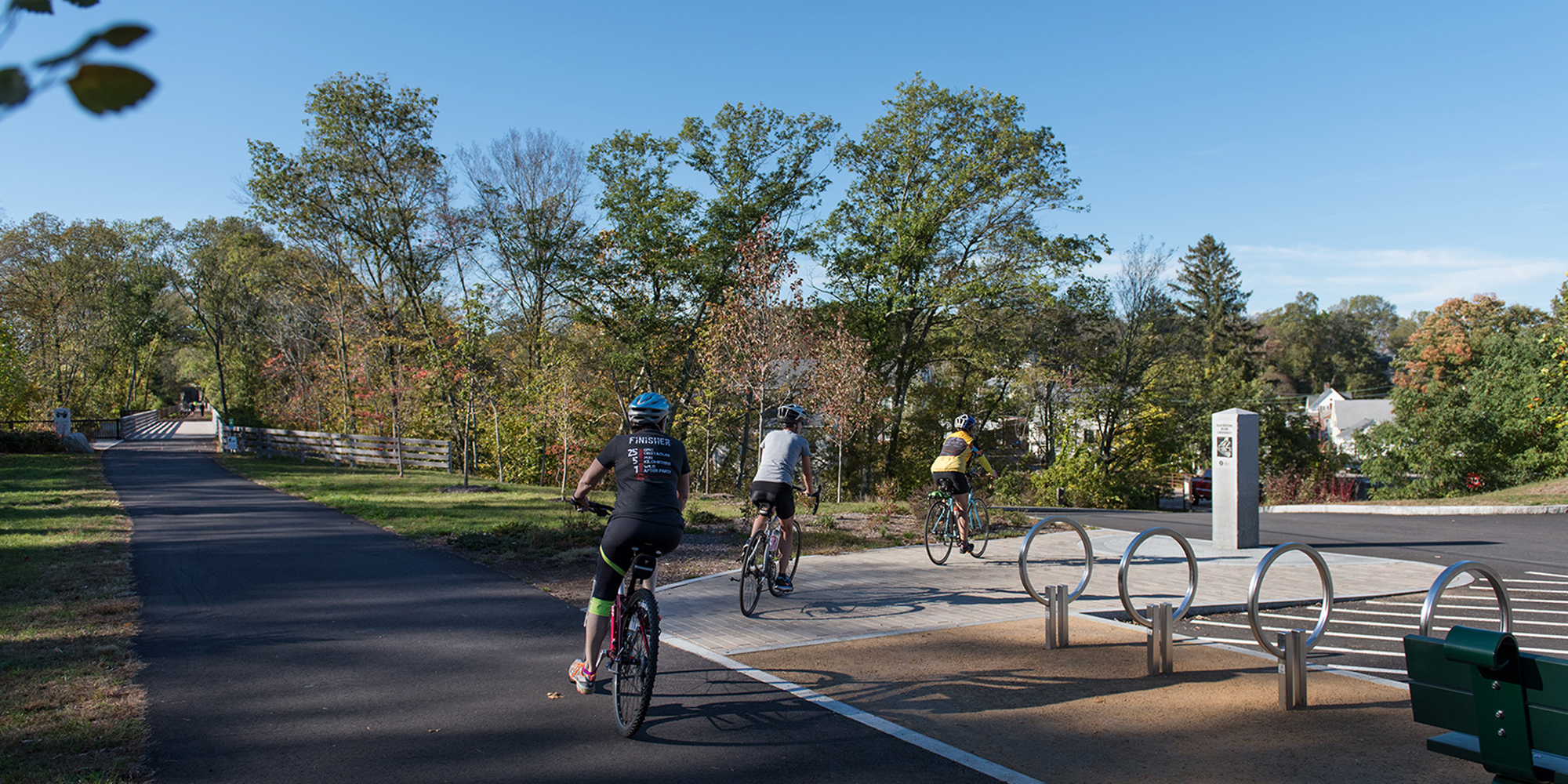 Cyclists along the Blackstone River Valley Greenway bike path