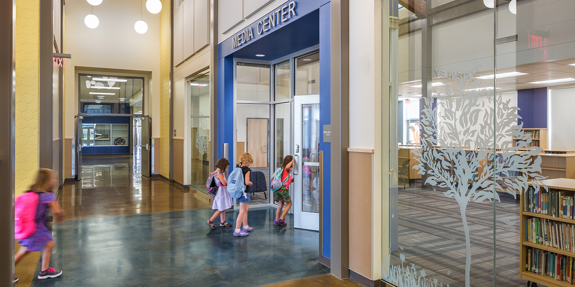 Students entering Media Center inside Henley Elementary School