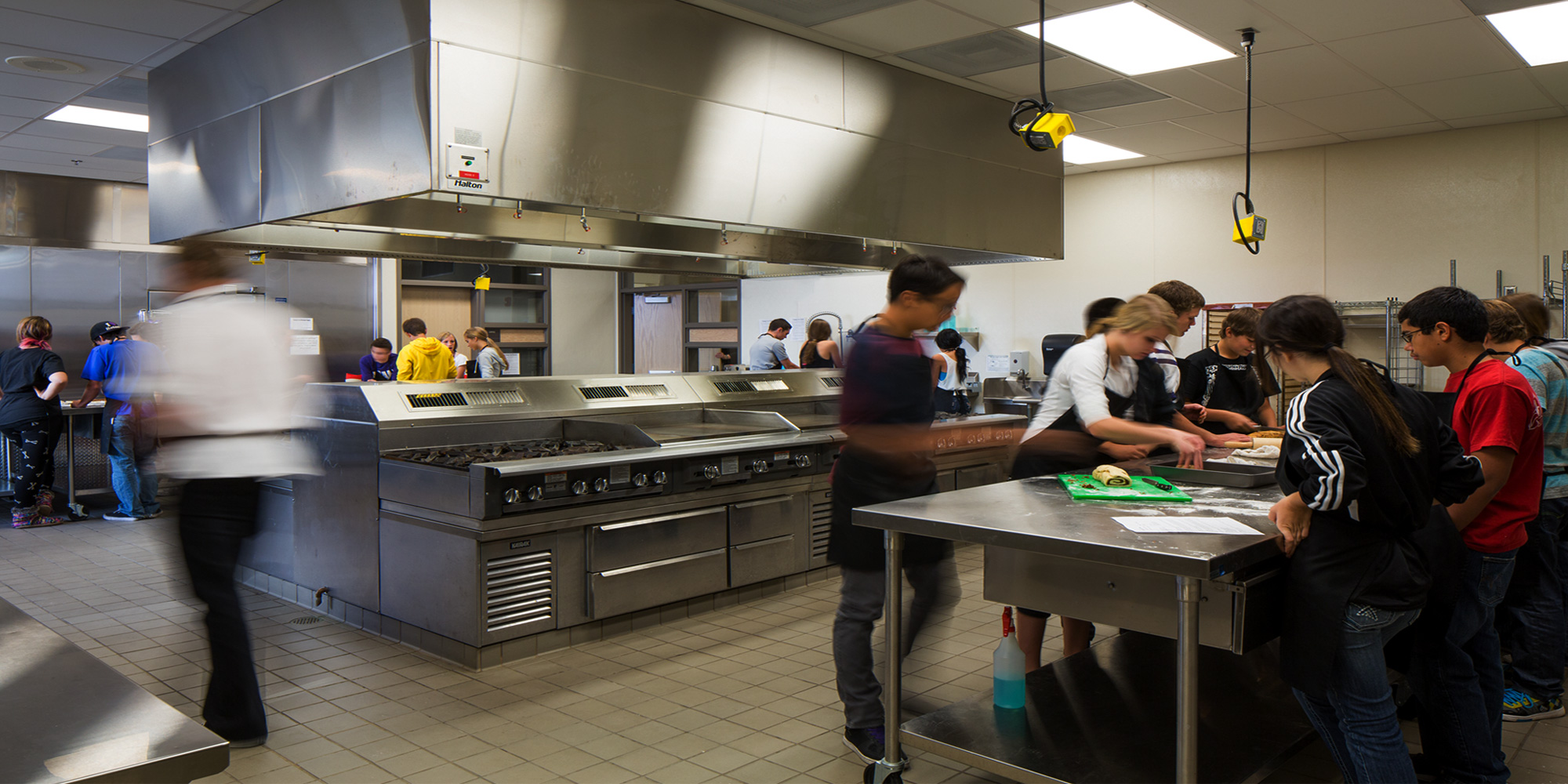 Students working inside kitchen at Ridgeview High School