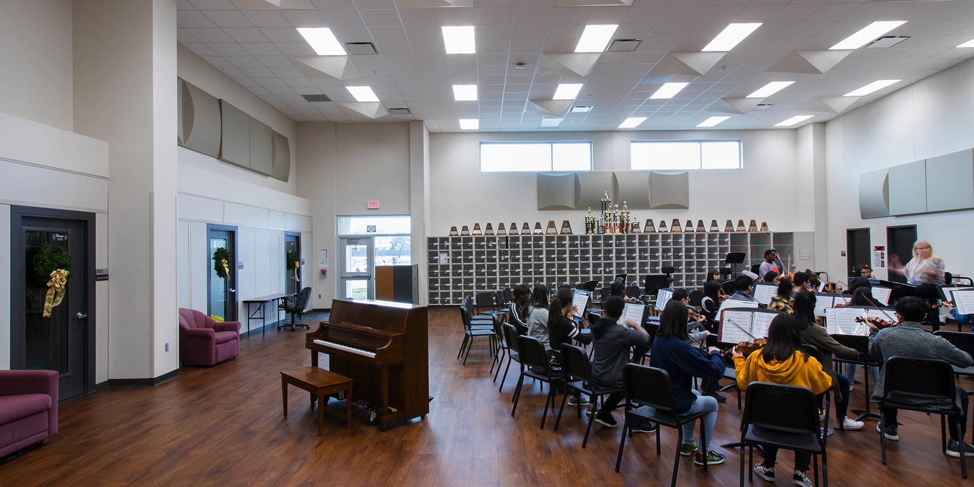 Students playing instruments inside Kerr High School