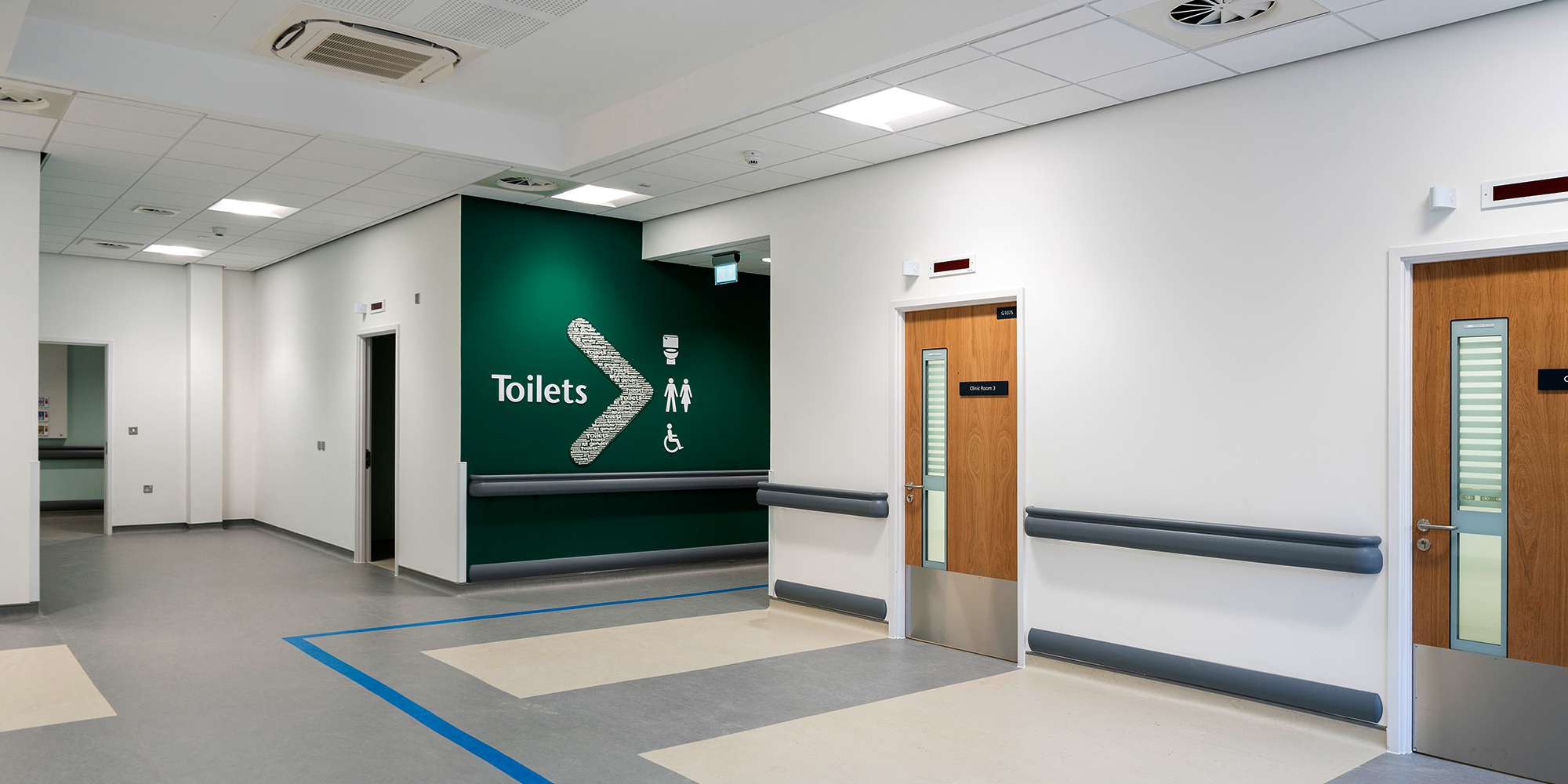 Hallway leading to bathroom inside NHS Golden Eye