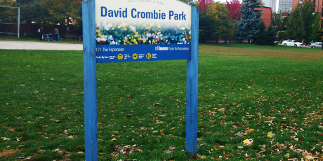 David Crombie Park sign in a field
